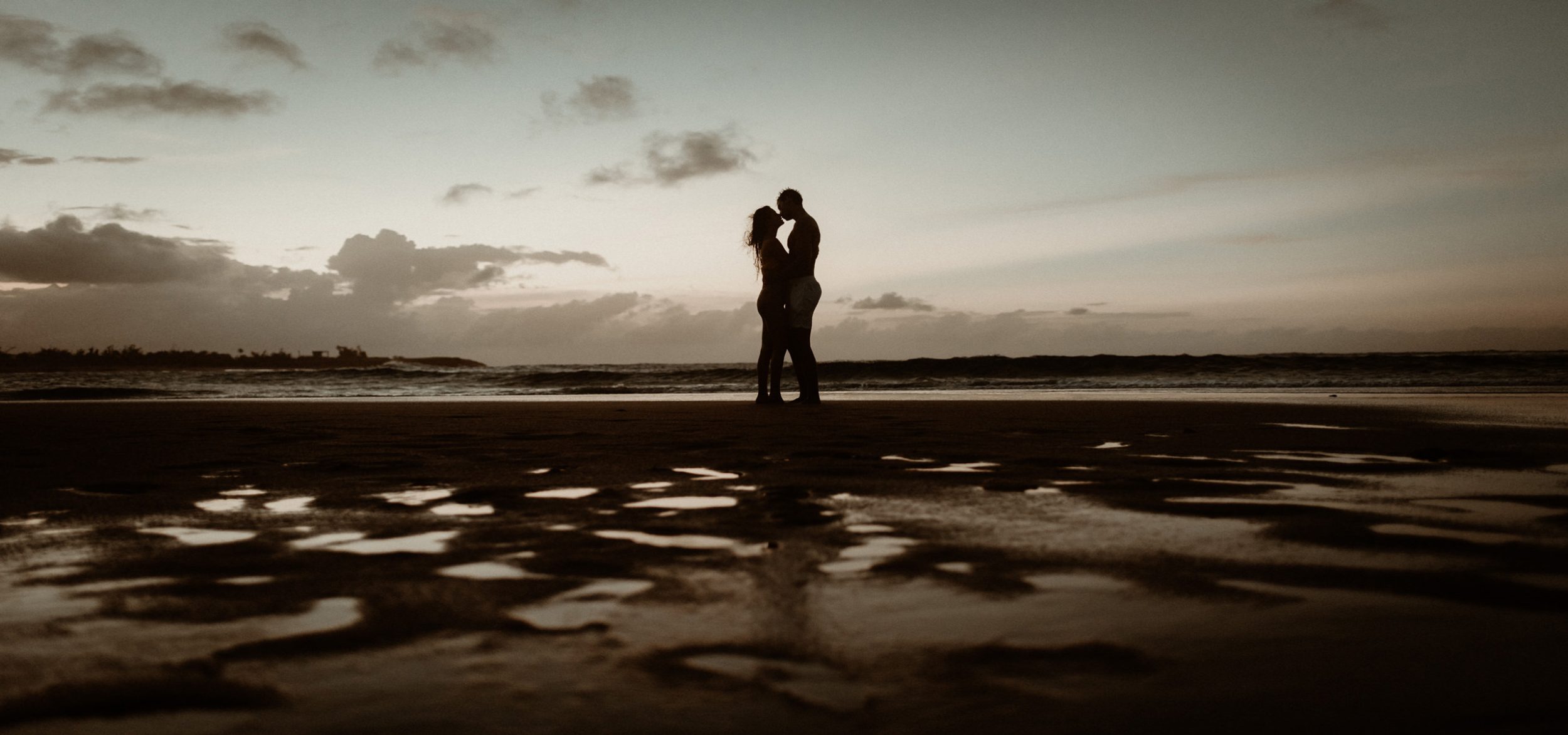 Silhouette of couple on beach in Puerto Rico