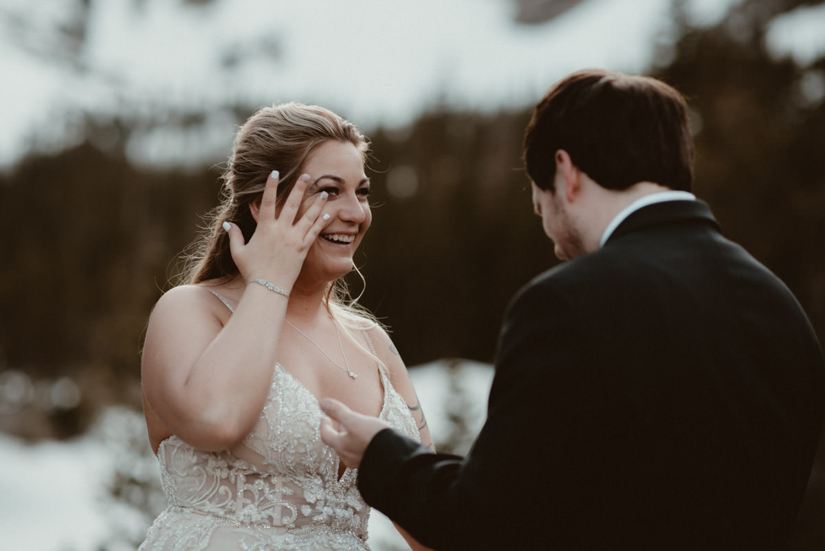 Bride crying happy tears at elopement in Colorado.