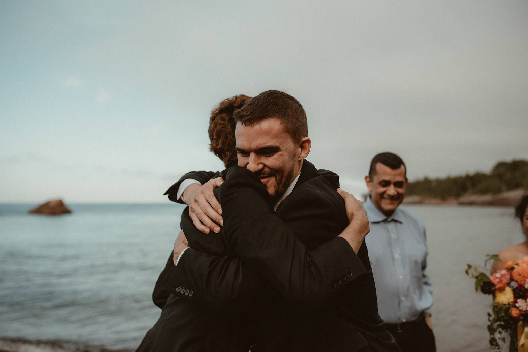 Elopement ceremony at Horseshoe Harbor near Copper Harbor, MI