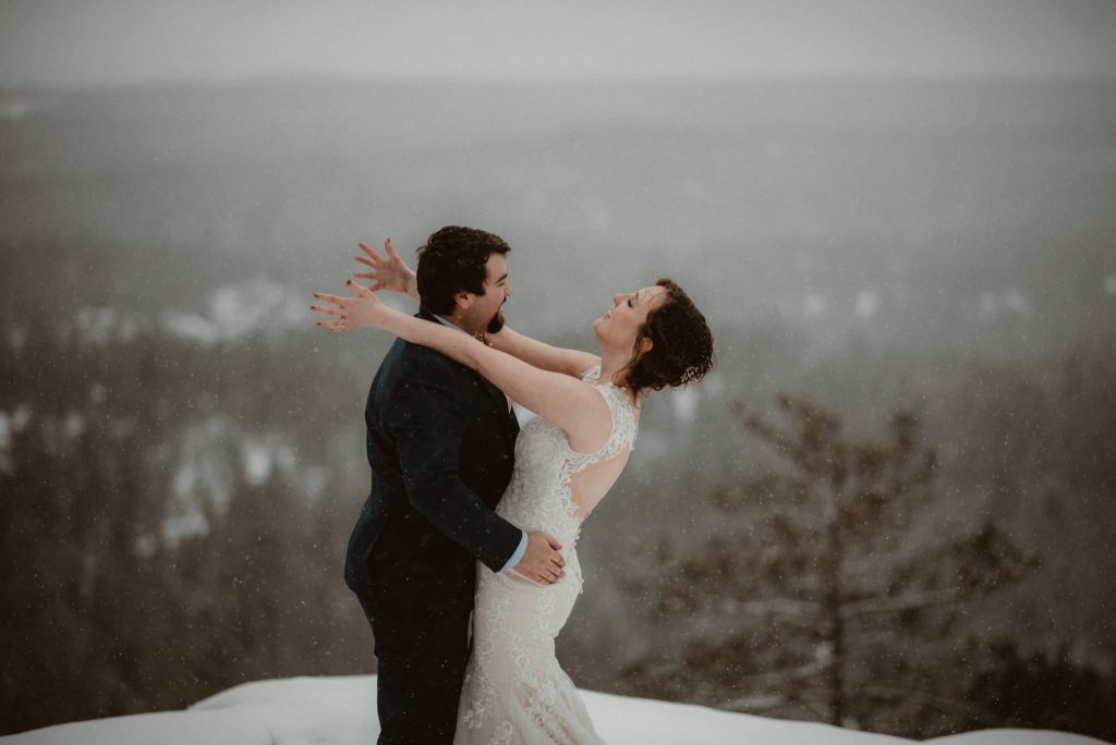 Elopement on Sugarloaf Mountain in Michigan in the snow