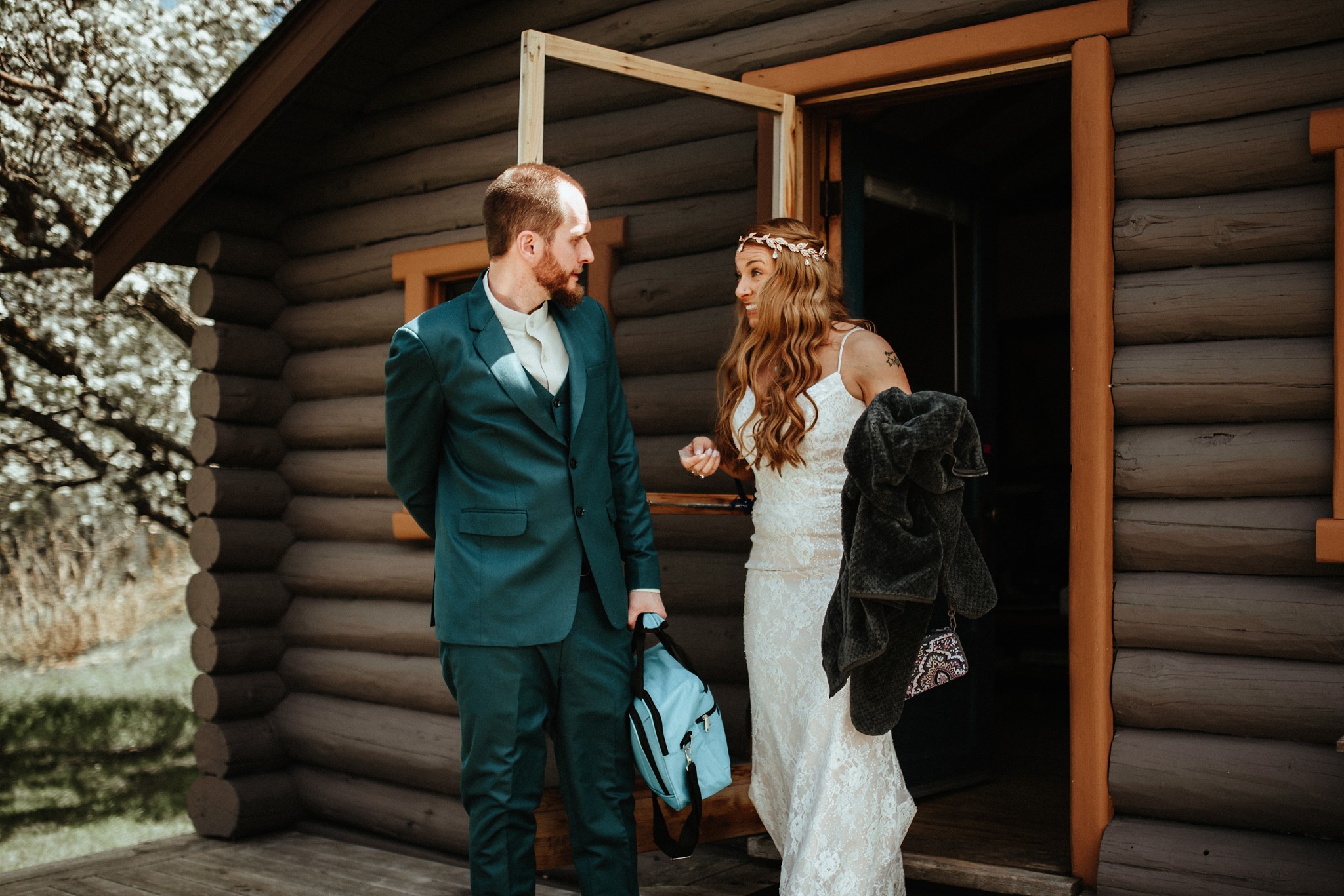 The couple leaving the cabin in excitement.