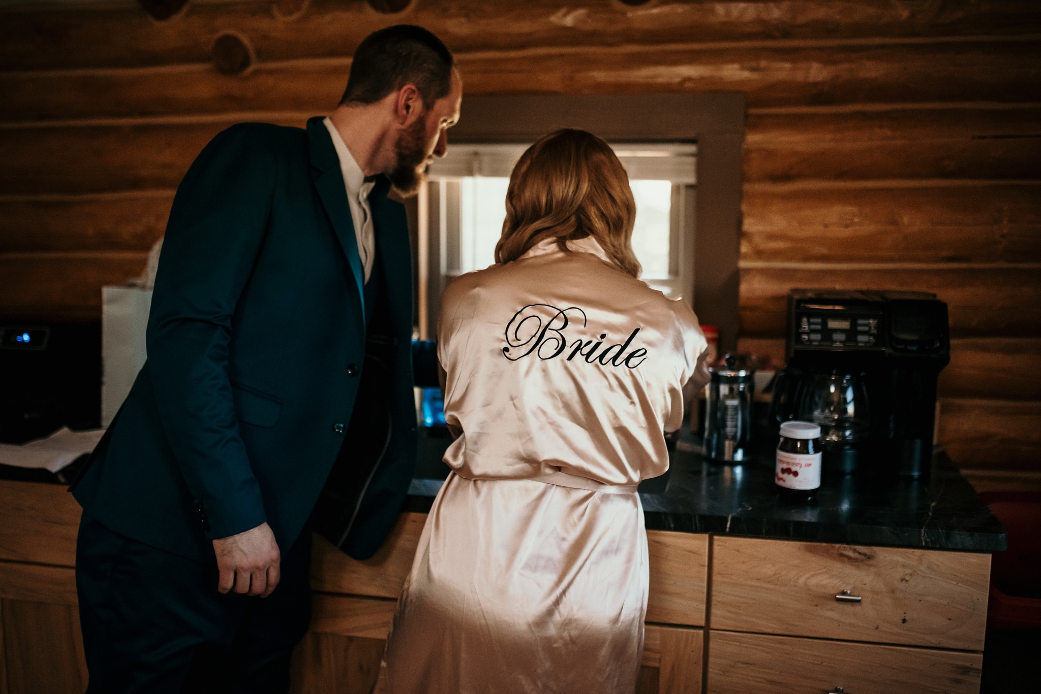 A bride and groom (to be) getting coffee before getting dressed.